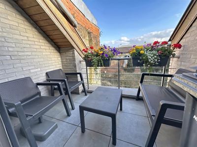 Instapklaar 2-slaapkamerappartement met terras vlakbij de Grote Markt.