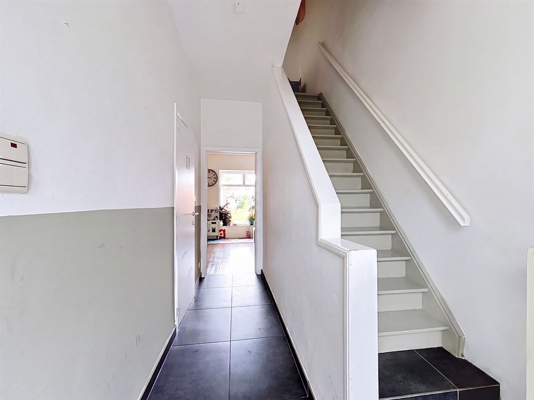 Energiezuinige gezinswoning met 4 slaapkamers en gezellige tuin.