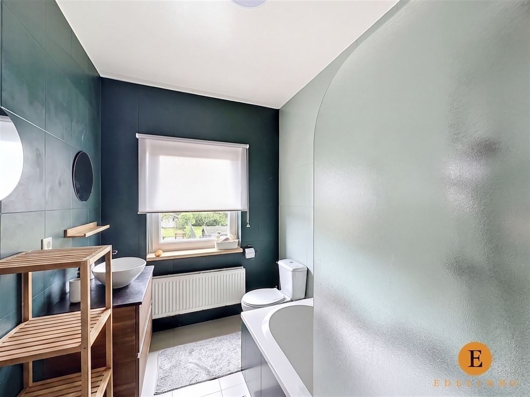 Energiezuinige gezinswoning met 4 slaapkamers en gezellige tuin.