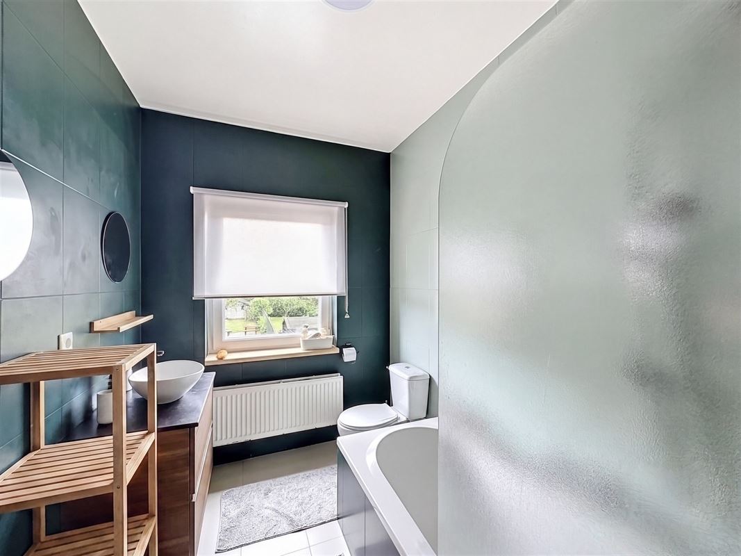 Energiezuinige gezinswoning met 4 slaapkamers en gezellige tuin.