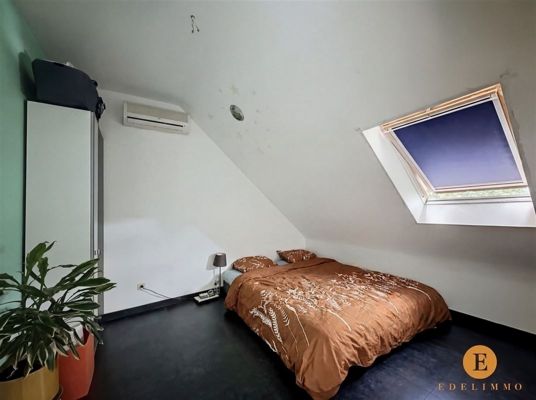 Energiezuinige gezinswoning met 4 slaapkamers en gezellige tuin.