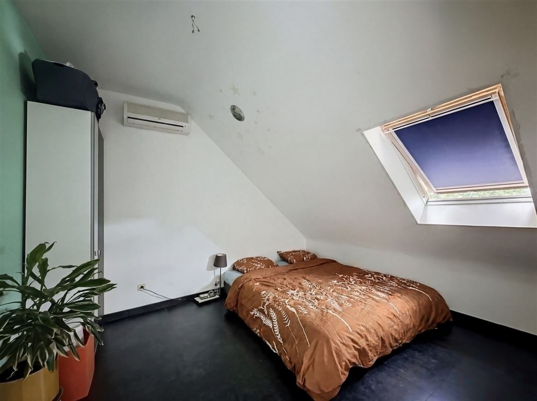Energiezuinige gezinswoning met 4 slaapkamers en gezellige tuin.