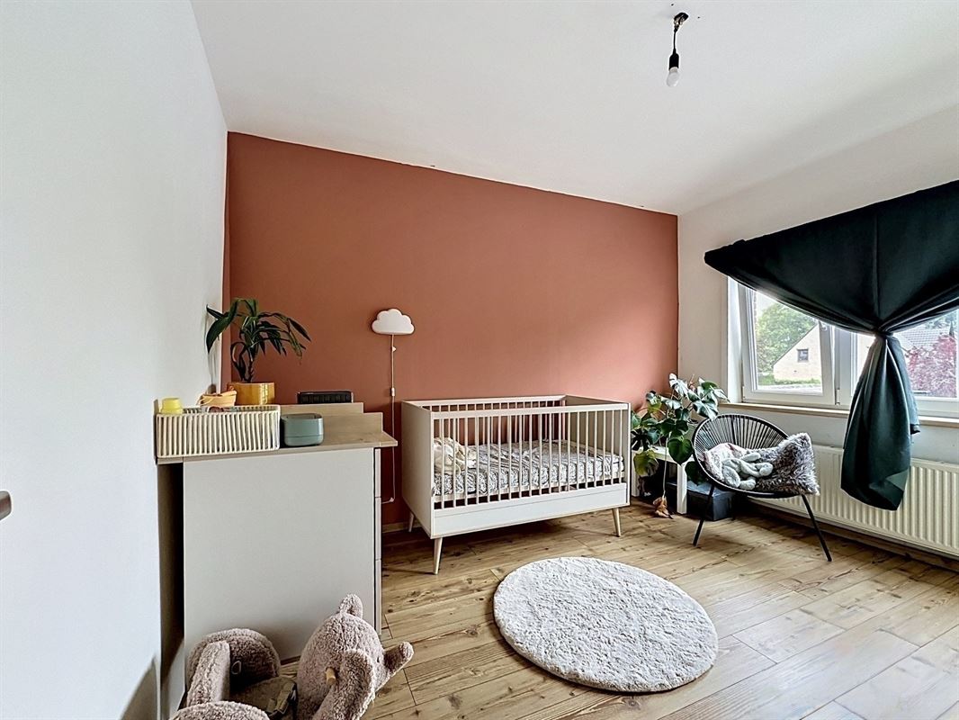 Energiezuinige gezinswoning met 4 slaapkamers en gezellige tuin.