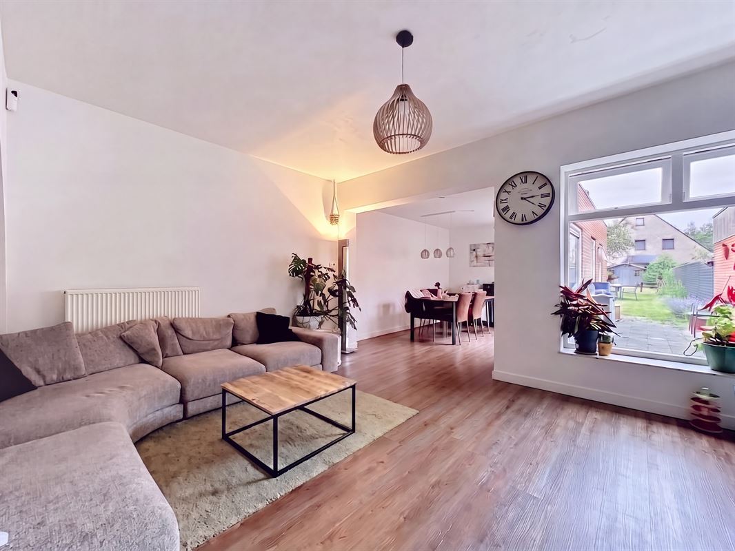 Energiezuinige gezinswoning met 4 slaapkamers en gezellige tuin.