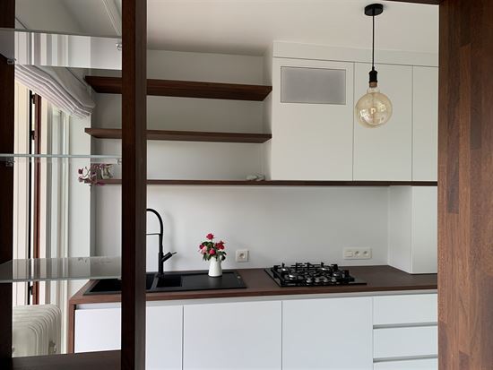 Gerenoveerd appartement met terras