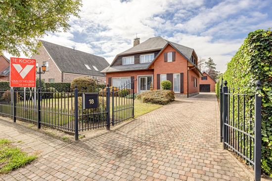 Charmante gezinswoning op 1300m² nabij het centrum
