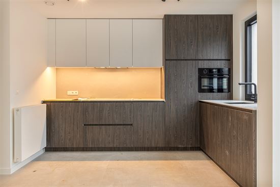 Gerenoveerd duplex appartement met tuin