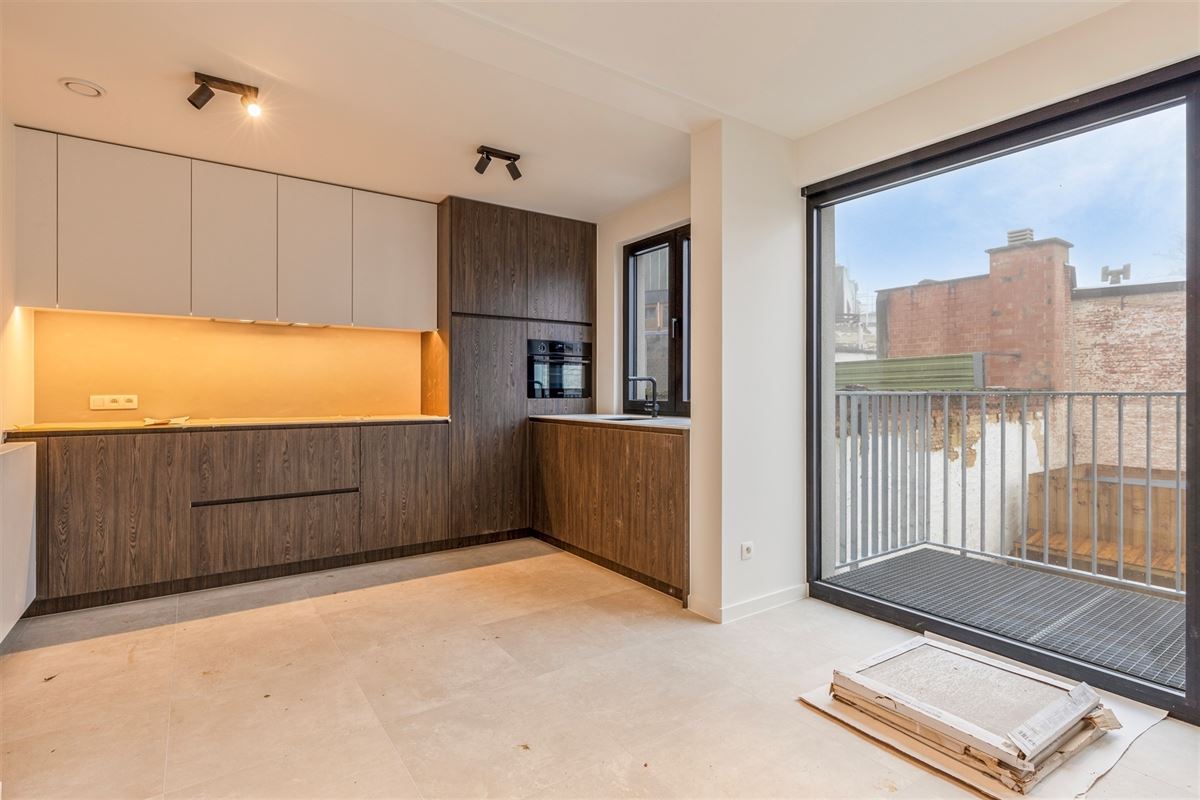 Gerenoveerd duplex appartement met tuin