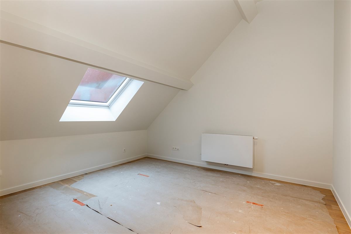 Gerenoveerd duplex appartement met tuin