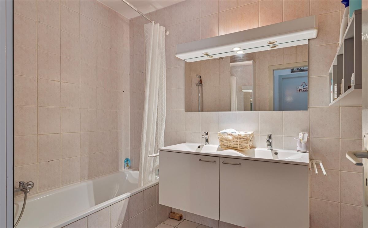 Gelijkvloers appartement met grote tuin