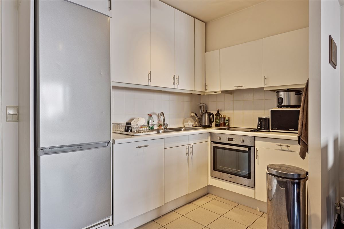Gelijkvloers appartement met grote tuin