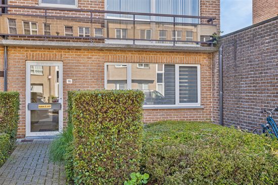 Gelijkvloers appartement met grote tuin