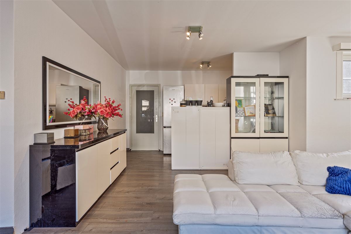 Gelijkvloers appartement met grote tuin