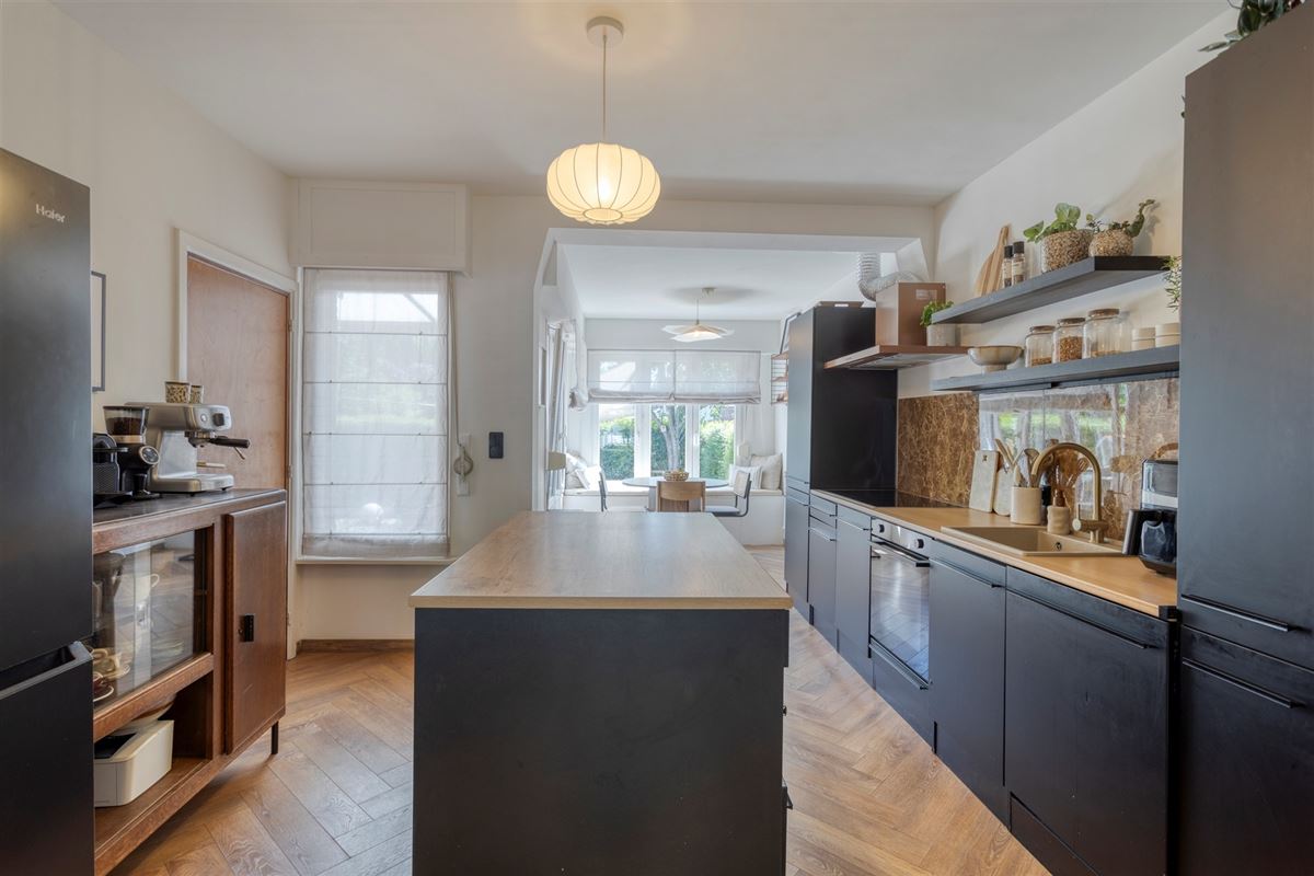 Instapklare halfopen bebouwing met garage te Edegem