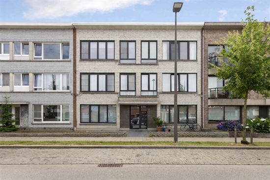 Appartement met terras in kleinschalig gebouw