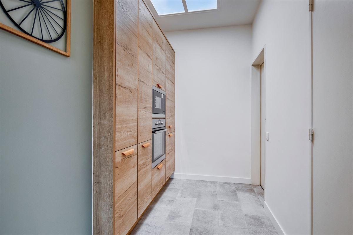 Uitzonderlijk lichtrijk dakappartement met 3 slaapkamers + P