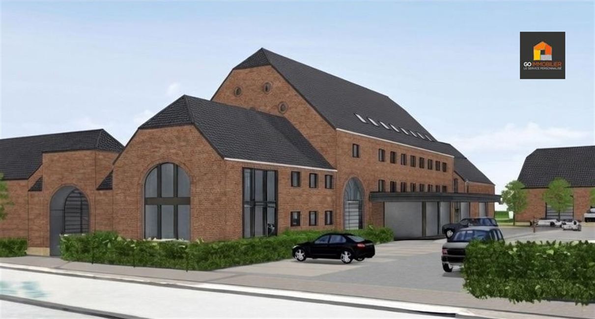 LOT 1 – Bâtiment à rue avec terrasse (± 180 m² exploitables)