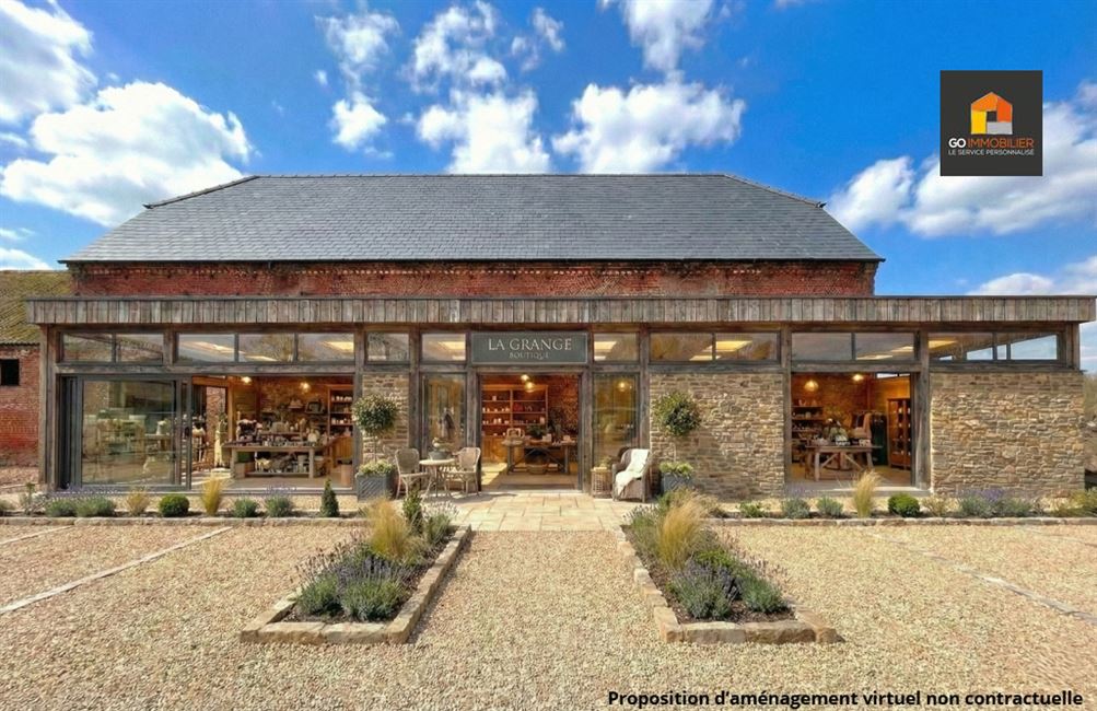 LOT 3 – Surface commerciale vitrée côté parking (± 140 m²)