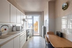 Ontdek dit lichtrijke appartement met een bewoonbare oppervlakte van 110m² op de 7de verdieping in Gent: een ideale uitvalsbasis voor wie comfort, be...