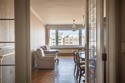 Ontdek dit lichtrijke appartement met een bewoonbare oppervlakte van 110m² op de 7de verdieping in Gent: een ideale uitvalsbasis voor wie comfort, be...