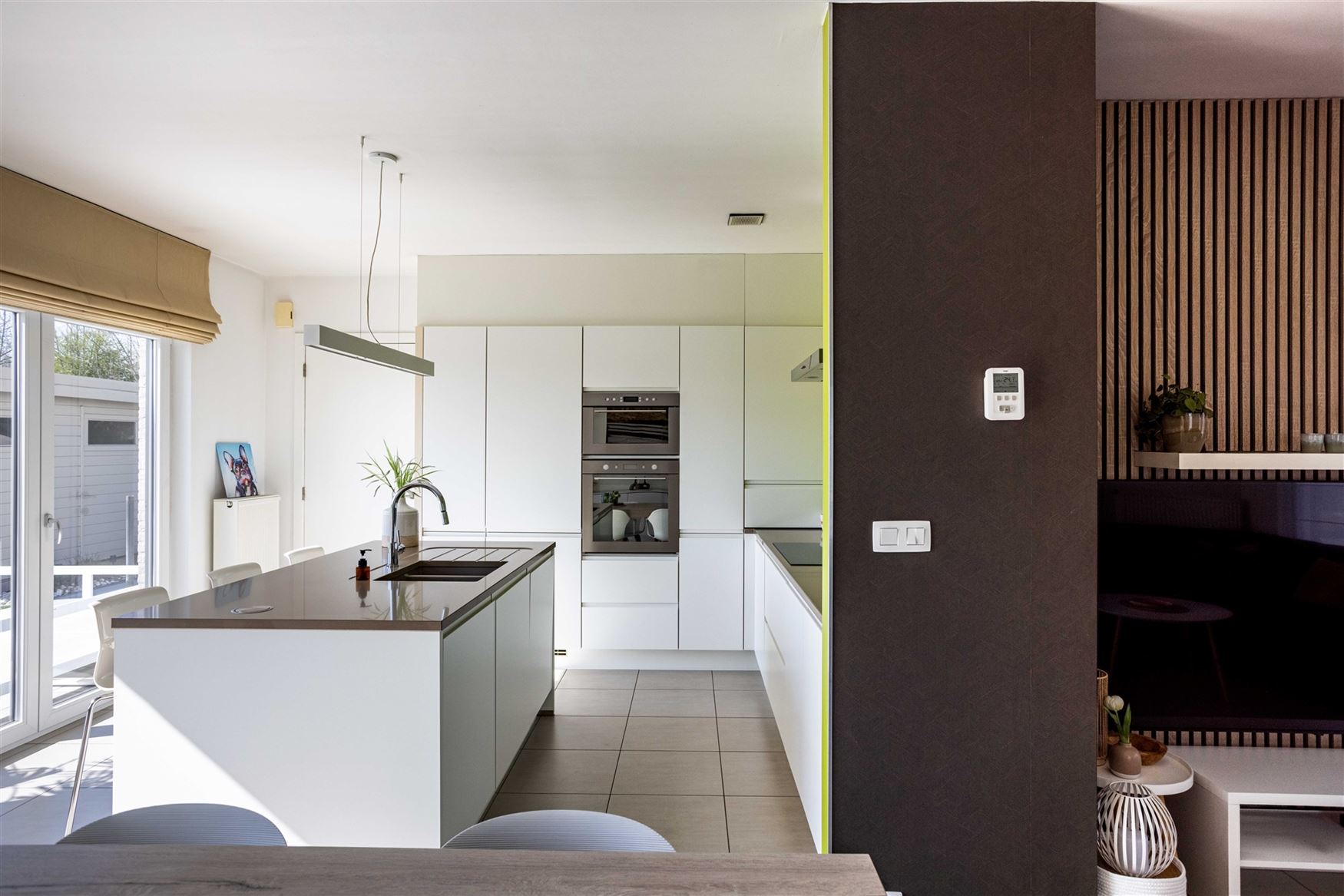 Deze moderne open bebouwing uit 2014 is gelegen in een rustige, doodlopende straat in Ursel, deelgemeente van Aalter.  De woning combineert hedendaags...