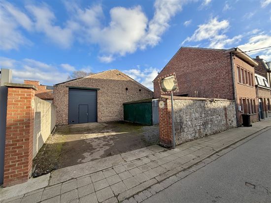 Absil Immobilière vous présente un entrepôt proche du centre