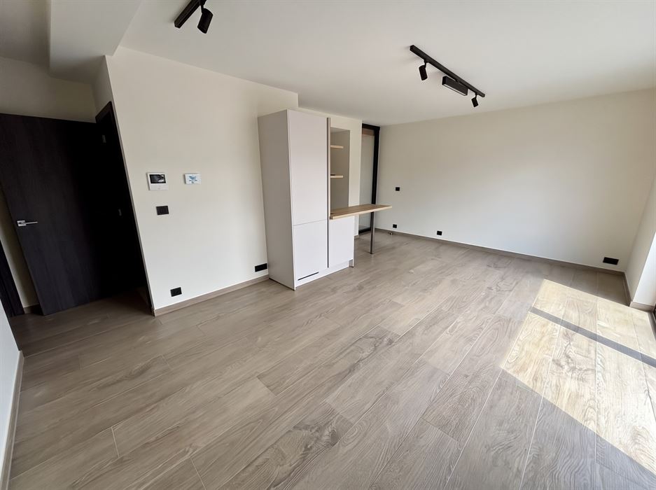 Absil Immobilière vous présente un appartement 1ch neuf