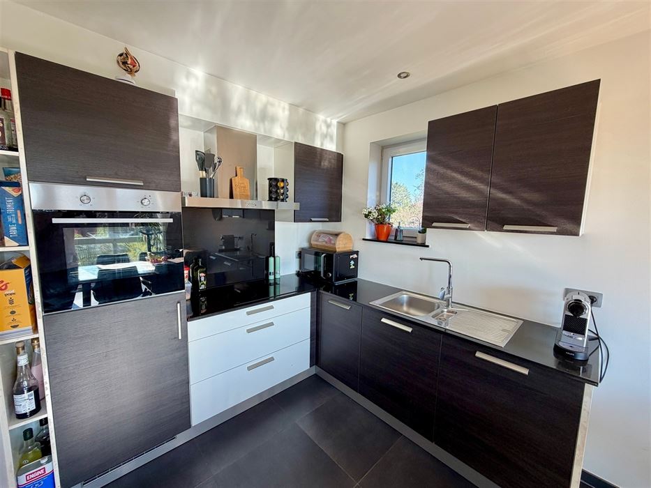 Absil immobilière vous présente un duplex 3ch