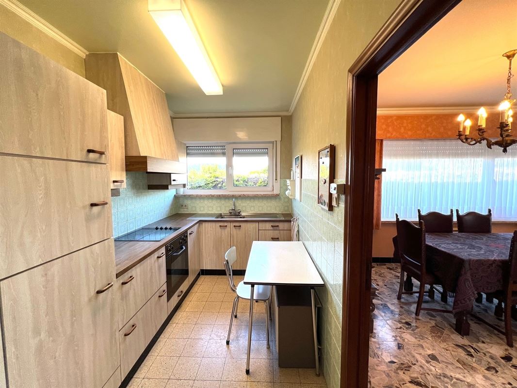 Landelijke woning in open karakter in een doodlopende straat naar een landbouwzone