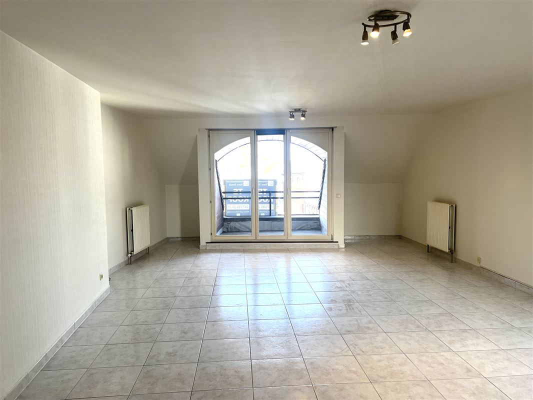 Appartement met terras en staanplaats in het centrum