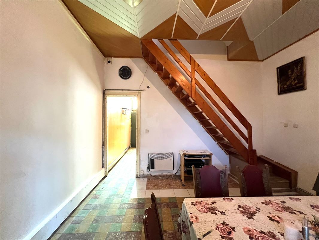 Rijwoning met tuintje en 4 slaapkamers