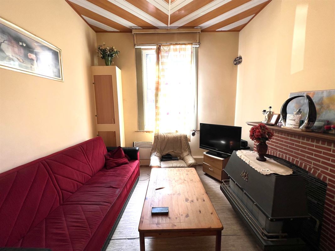 Rijwoning met tuintje en 4 slaapkamers