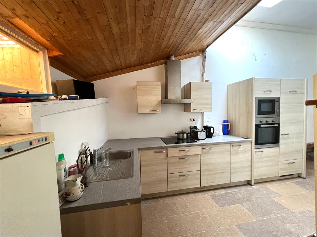 Rijwoning met tuintje en 4 slaapkamers