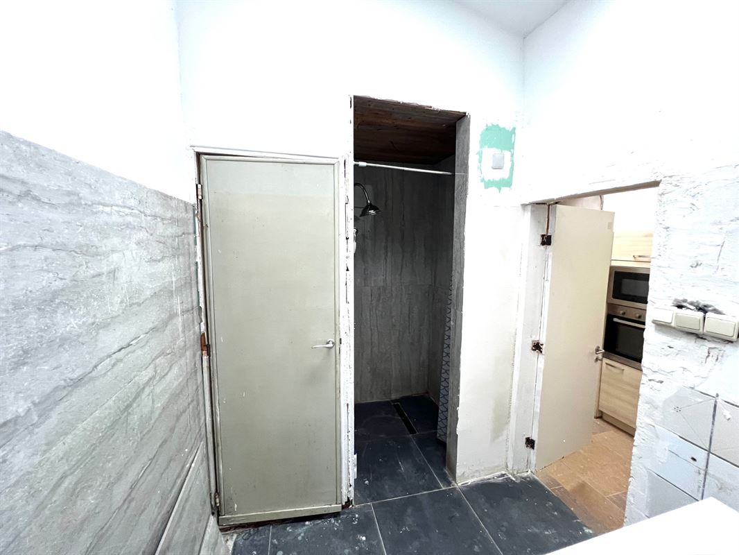 Rijwoning met tuintje en 4 slaapkamers