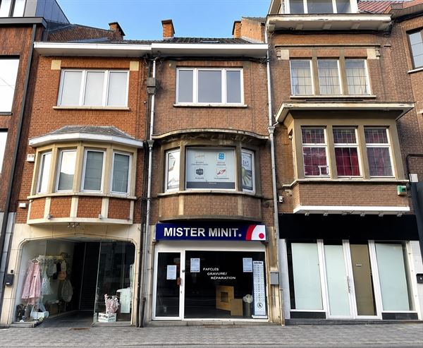 Maison de commerce dans le centre
