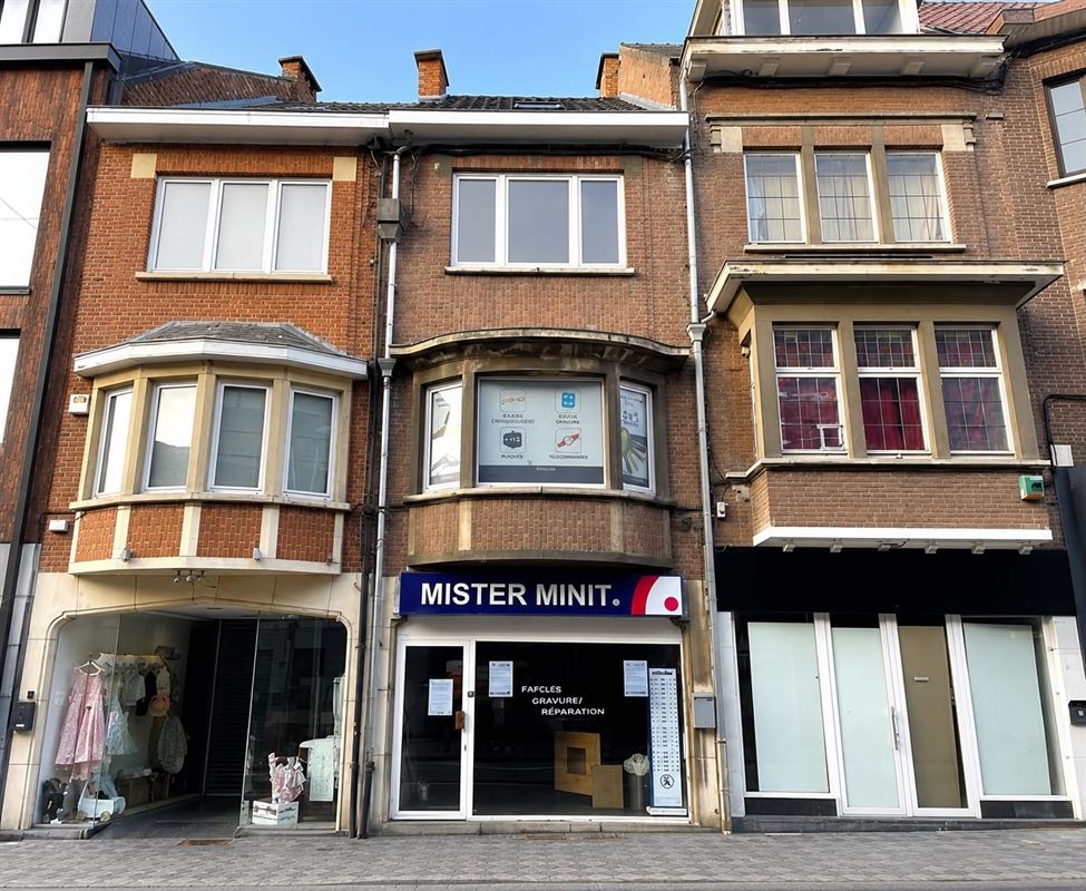 Maison de commerce dans le centre