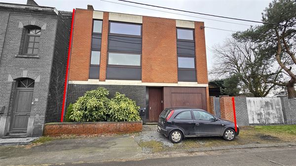 Immeuble comprenant deux appartements et un petit "atelier"