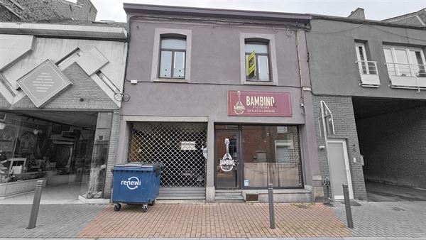 Commerce + appartement + petit entrepot