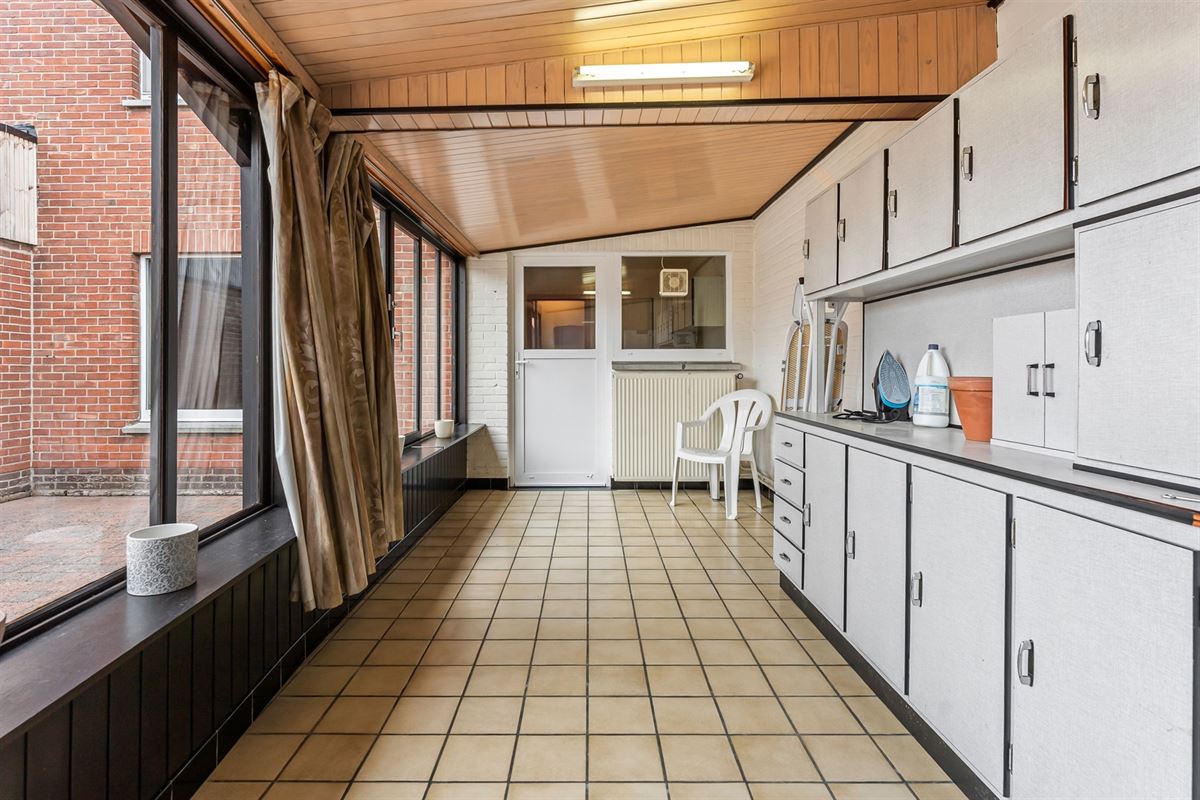 PERFECT ONDERHOUDEN WONING MET ACHTERINRIT NAAR TUIN IN BERINGEN CENTRUM