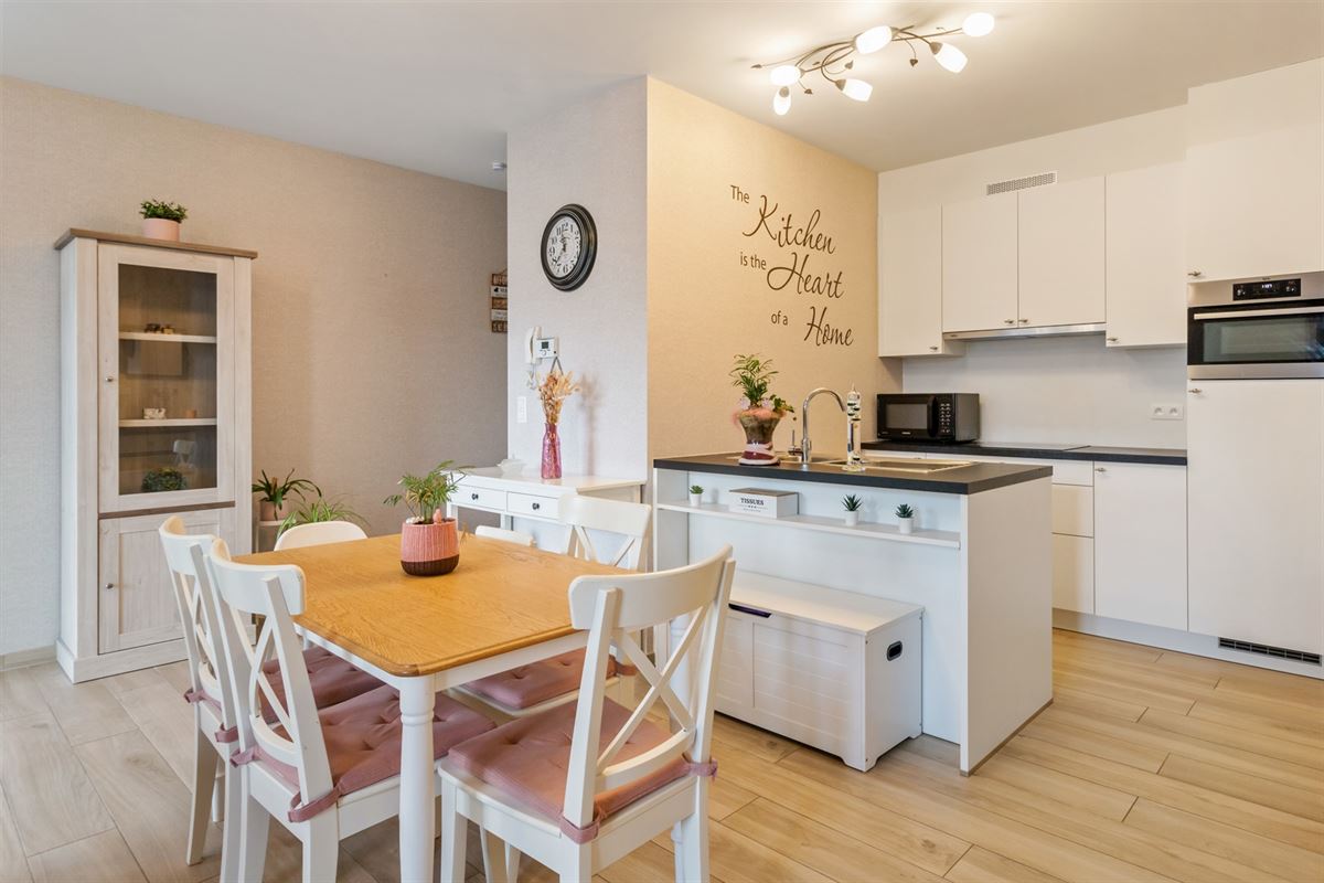 RECENT GELIJKVLOERS APPARTEMENT MET BIJHOREND TERRAS EN RUIME PRIVATE TUIN GELEGEN TE MEERHOUT