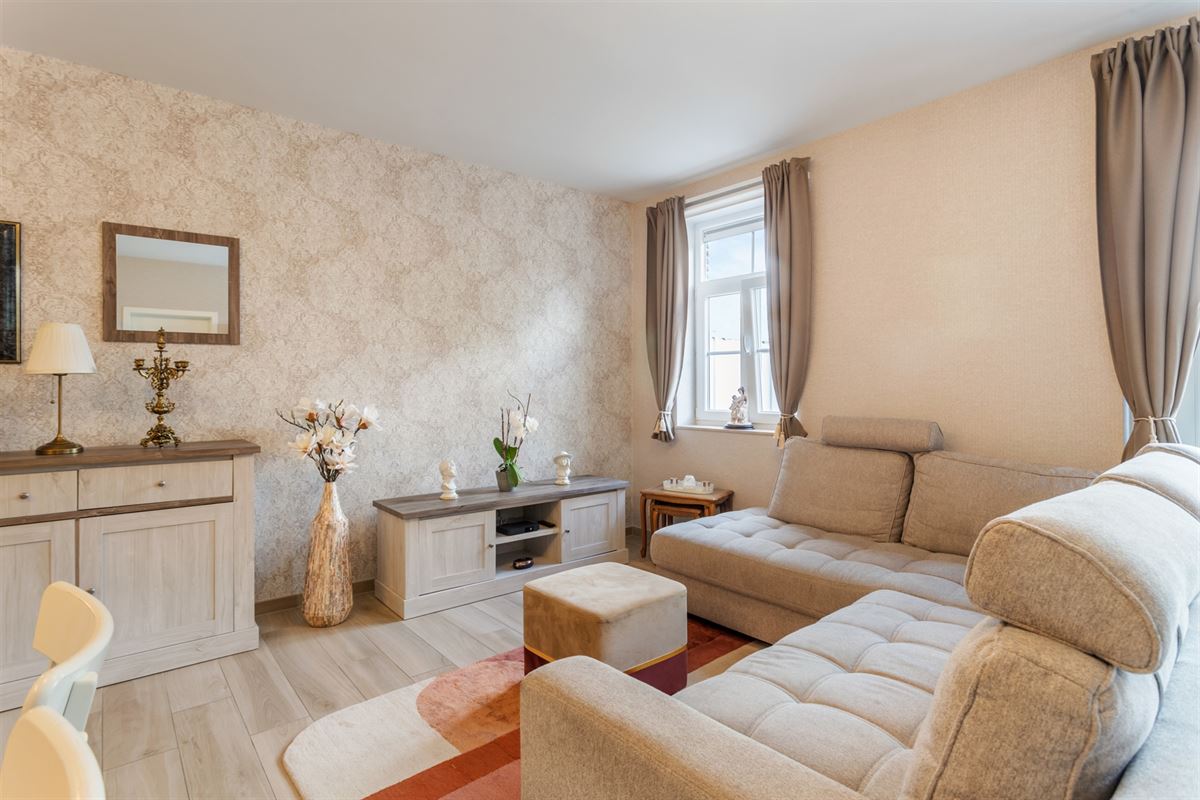 RECENT GELIJKVLOERS APPARTEMENT MET BIJHOREND TERRAS EN RUIME PRIVATE TUIN GELEGEN TE MEERHOUT