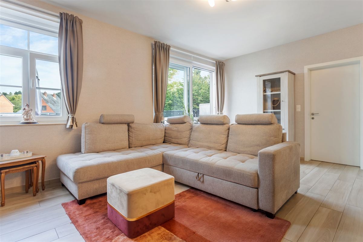 RECENT GELIJKVLOERS APPARTEMENT MET BIJHOREND TERRAS EN RUIME PRIVATE TUIN GELEGEN TE MEERHOUT