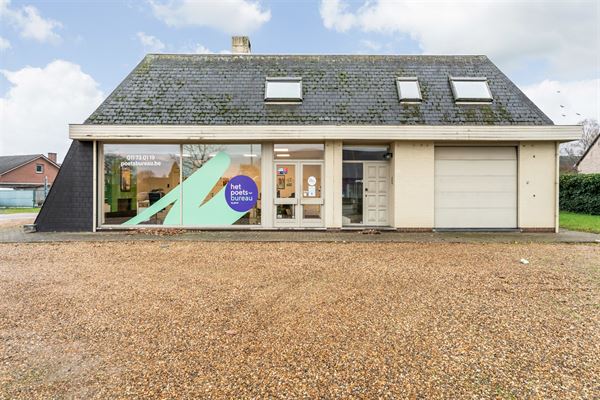 HANDELSPAND MET GOEDE VISIBILITEIT EN RUIME PARKING MET BOVENLIGGEND APPARTEMENT IN HEUSDEN-ZOLDER