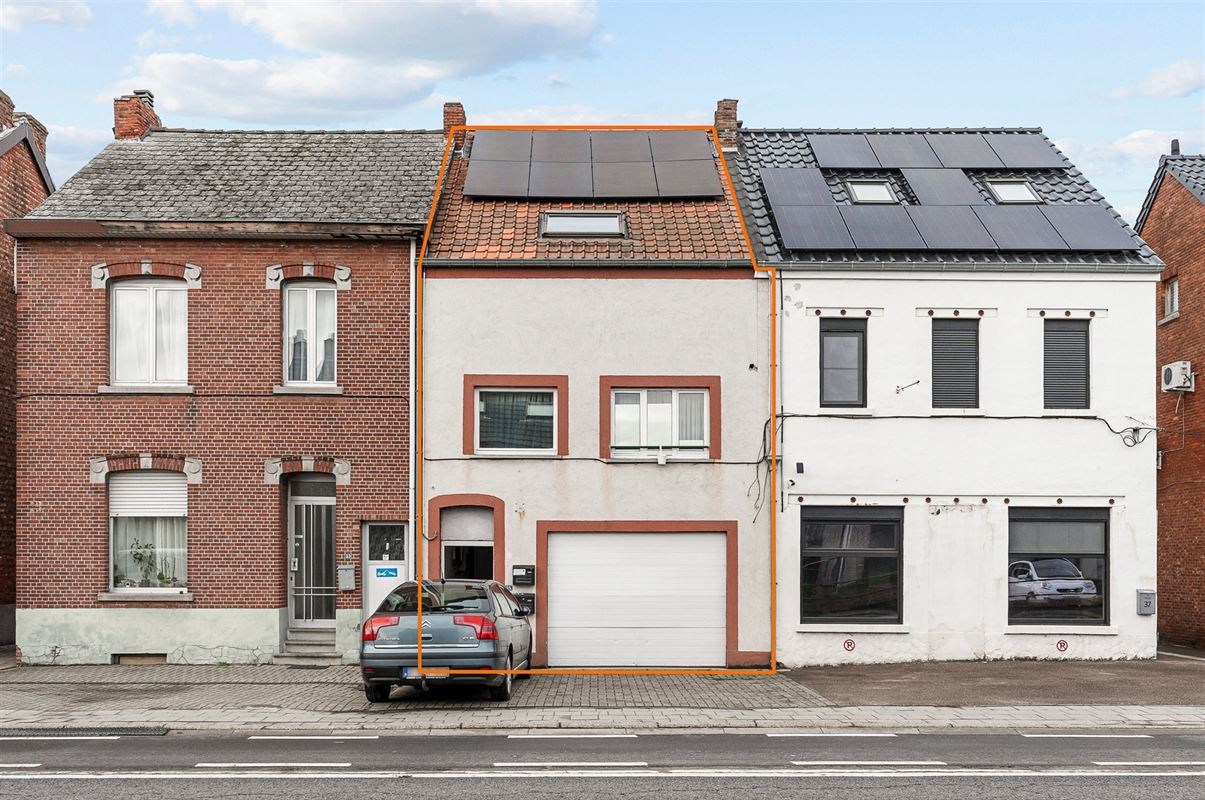 TE RENOVEREN WONING MET BOVENLIGGEND APPARTEMENT GELEGEN TE HEPPEN