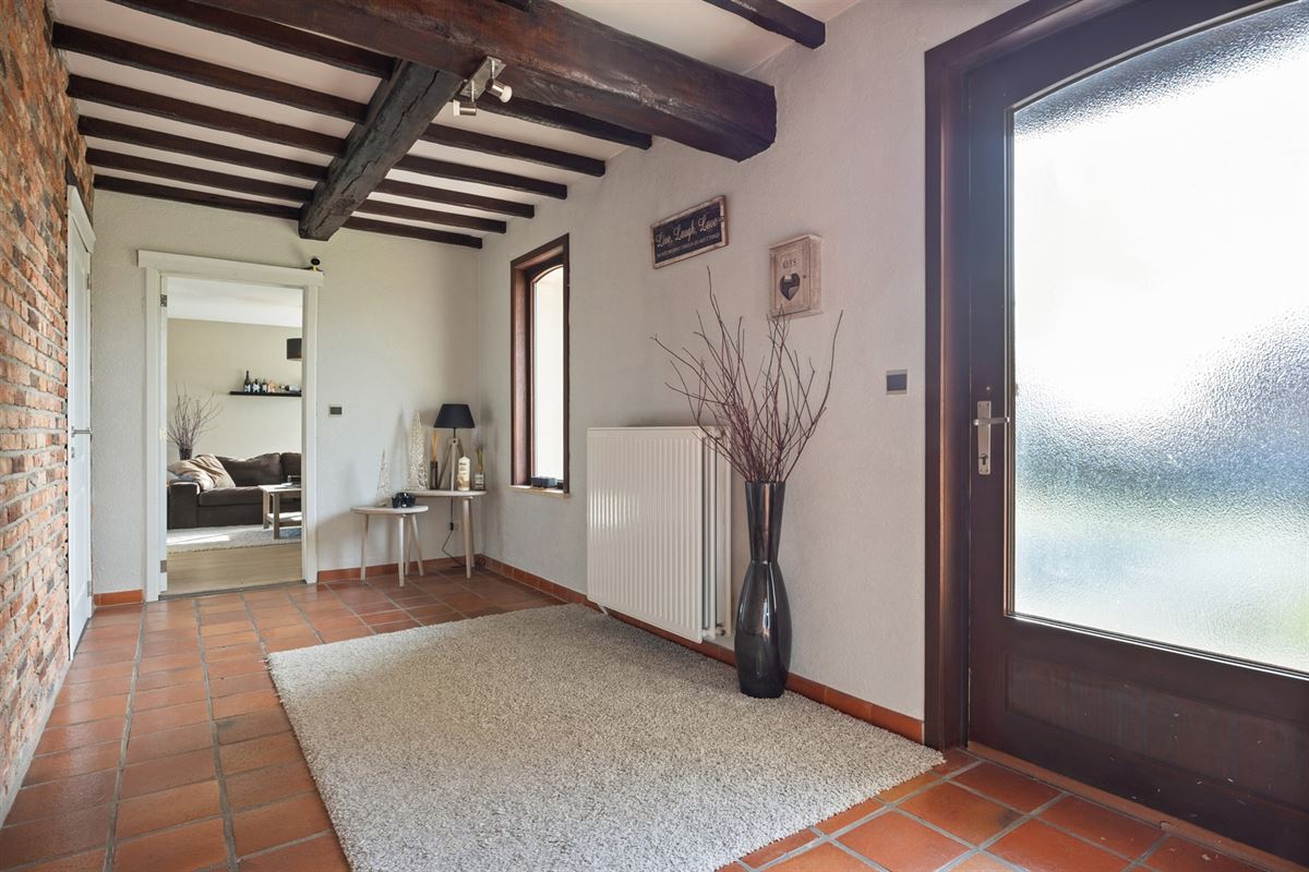 KARAKTERVOLLE GELIJKVLOERSE WONING (246M²) OP EEN PERCEEL VAN 25A41CA TE HALEN