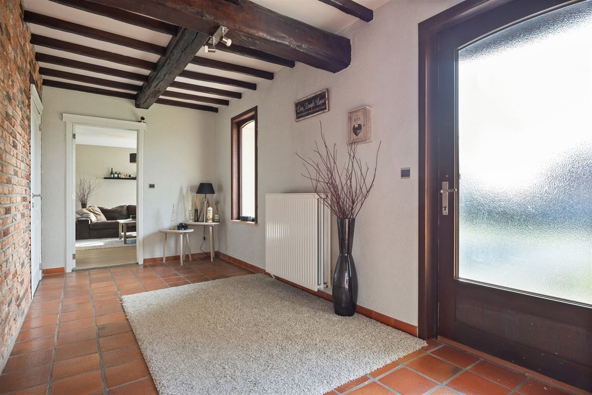 KARAKTERVOLLE GELIJKVLOERSE WONING (246M²) OP EEN PERCEEL VAN 25A41CA TE HALEN