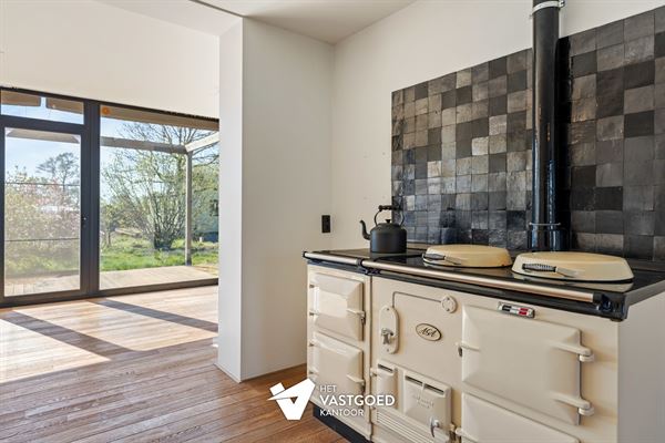 ZEER RUIME WONING MET TAL VAN MOGELIJKHEDEN OP BREED PERCEEL VAN 15 ARE TE KOERSEL