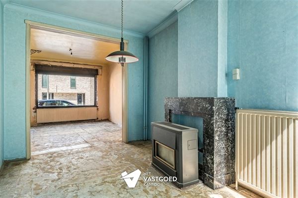 TE RENOVEREN STADSWONING MET RUIME TUIN EN GARAGE IN BERINGEN-CENTRUM