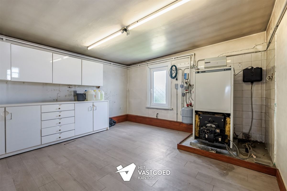 WONING MET POTENTIEEL EN CA 90M2 BIJGEBOUWEN OP MOOIE LIGGING