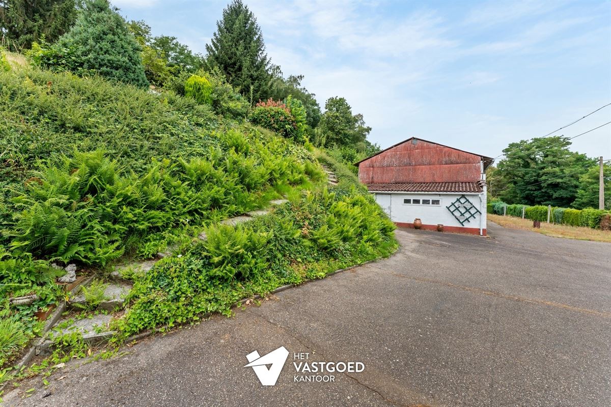 TE RENOVEREN KNUSSE WONING MET TUIN VAN 48A90CA EN LOODS EN GARAGE TE KAGGEVINNE